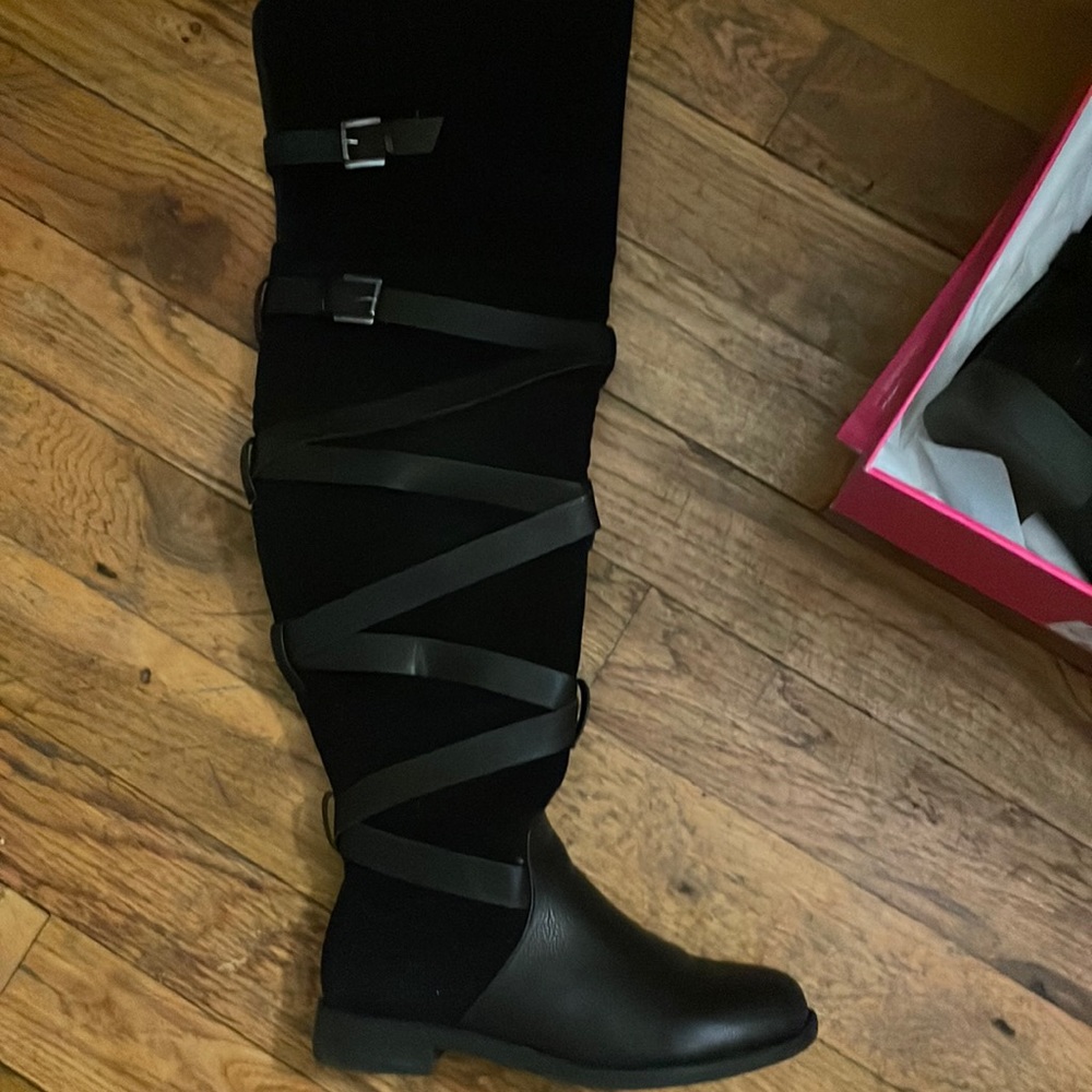 Thigh high black boot